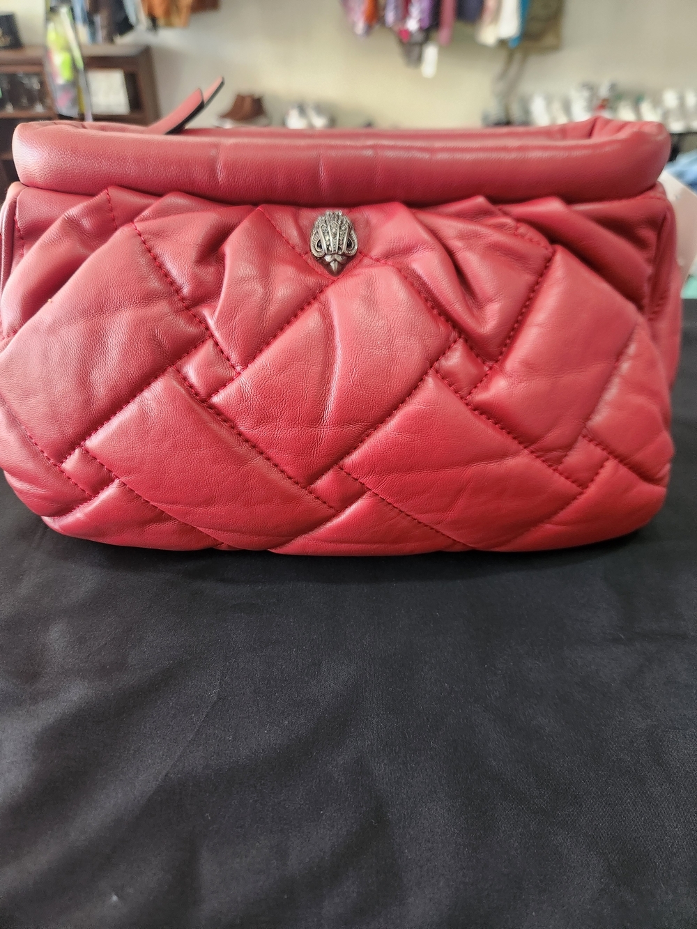 Kurt Geiger Quilted Red Leather Shoulder Bag with Metal Emblem